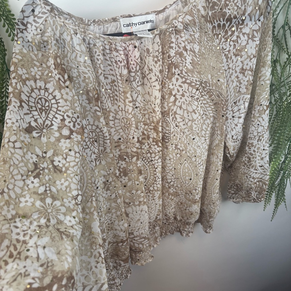 Cathy Daniel’s blouse. Size large. Gold and cream sparkle. Scoop neck.